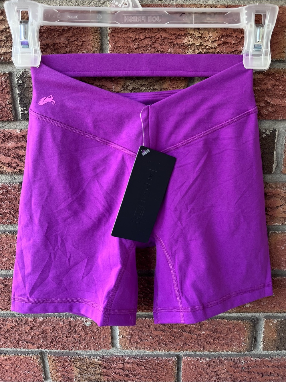 Alphalete BNWT women’s purple shorts Sz small